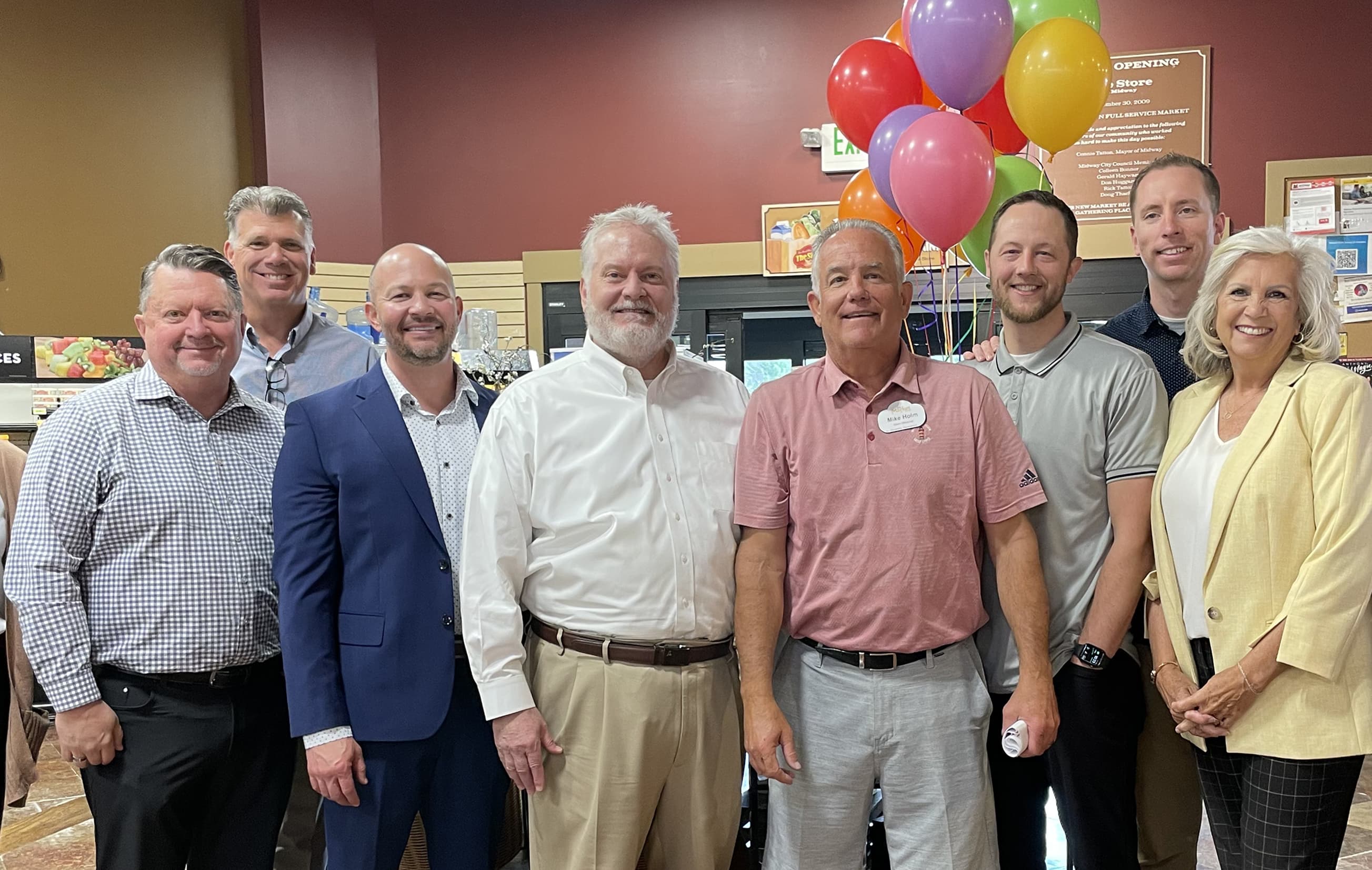 Local leaders and neighbors celebrating a Wasatch Back community project